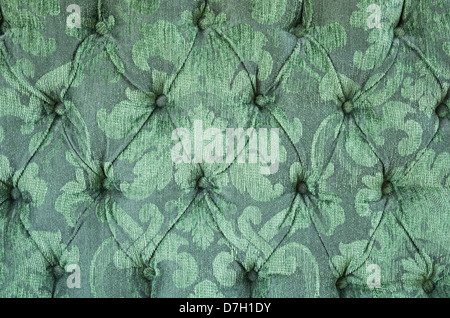green patterned velvet upholstery for background texture Stock Photo