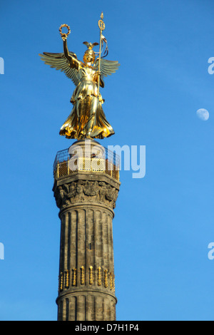 Golden angel of the Column of Victory 'Siegessäule' located in Tiergarten in Berlin, Germany Stock Photo