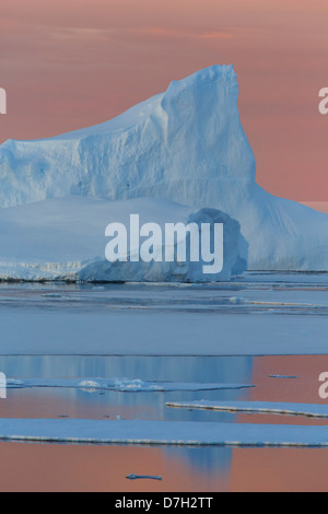 Sunset / sunrise as we travel below the Antarctic Circle, Antarctica.  Stock Photo