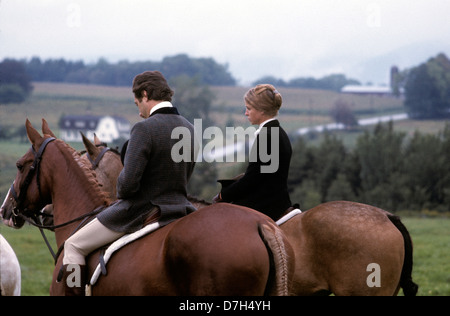 couple riding in fox hunt in sugarbush vermont praying hunt Stock Photo