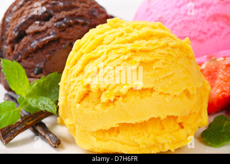 Three scoops of ice cream with different flavors Stock Photo