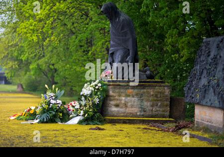 Wreaths are laid down at the memorial 'The Mother' to commemorate the end of World War II on 08 May 1945, in Raben-Steinfeld, Germany, 08 May 2013. Mecklenburg-Western Pomerania is the only German state which commits this day as official Remembrance Day. Photo: JENS BUETTNER Stock Photo