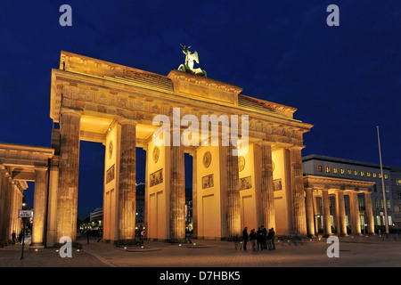 The Brandenburg Gate in Berlin at night Stock Photo