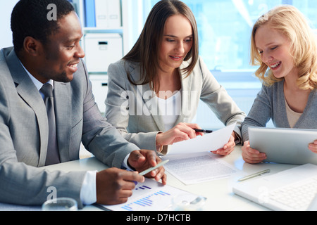 Managers being gathered to discuss business plan Stock Photo