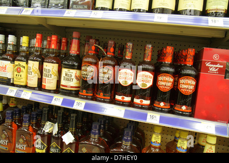 Miami Beach Florida,Walgreens,liquor store,shelf shelves,retail display case sale,prices,bottles,alcoholic drink drinks,Southern Comfort,Wild Turkey,b Stock Photo