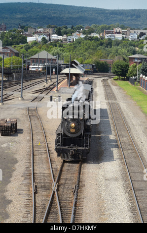 Steam locomotive leaving passenger platform at Steamtown National Historic Site, Scranton, PA Stock Photo