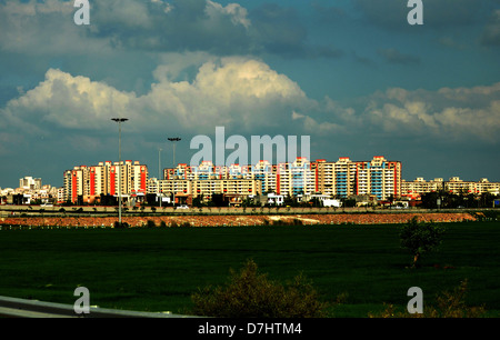 Apartment blocks stand under construction in Noida, Uttar Pradesh, India. Metropolitan area of Delhi Stock Photo