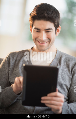 Man using tablet pc Stock Photo