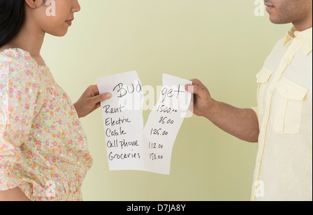 Young couple fighting over home budget Stock Photo