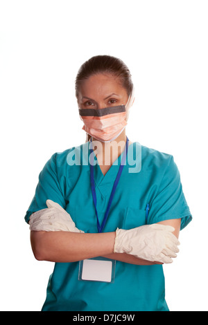Portrait of a nurse wearing a protective face mask with eye-shield. Smiling Stock Photo