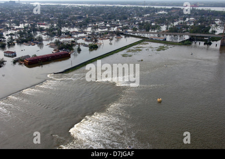 Aerial view of massive flooding and destruction caused by Hurricane Katrina submerging neighborhoods and roads as water breaches the levee August 30, 2005 in New Orleans, LA. Stock Photo