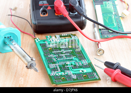 Test repair job on electronic printed circuit board Stock Photo