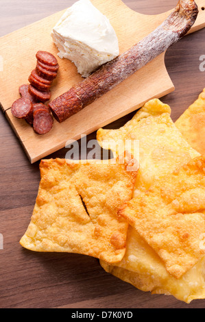 Domastic breakfast in Serbia. Listici, meat and cheese cream Stock Photo