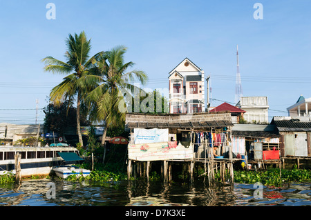 Mekong Delta, Vietnam - typical waterside housing on stilts - near to Can Tho Stock Photo