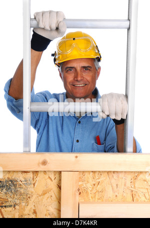 Closeup of a construction worker climbing a ladder isolated over white. Stock Photo