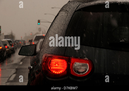 Traffic is stopped as a winter storm drops snow on Speedway Boulevard, Tucson, Arizona, USA. Stock Photo