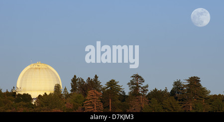 Moon rising at Mount Wilson Observatory in California. Mt Wilson is located on San Gabriel Mountains. Stock Photo