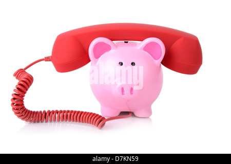 call the bank for support or telephone banking concept piggy bank with red phone receiver isolated on white Stock Photo