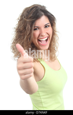 Portrait of a pretty teen with thumb up gesture on a white isolated background Stock Photo