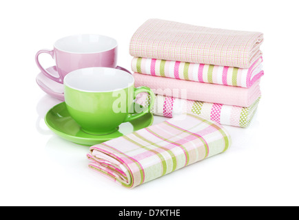 Kitchen towels and coffee cups. Isolated on white background Stock Photo