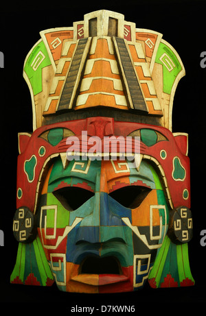 Wooden Mayan mask on a black background Stock Photo