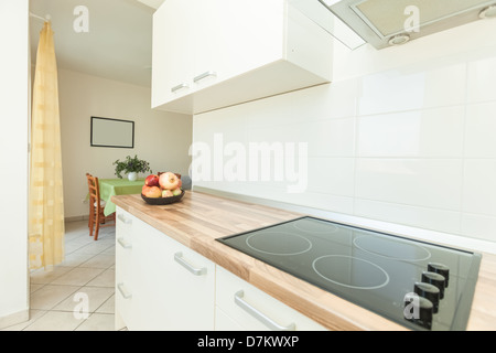 Modern and bright kitchen in house interior Stock Photo