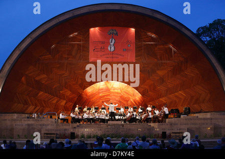 Boston Landmarks Orchestra performs at the Hatch Shell on the Esplanade in Boston Massachusetts Stock Photo