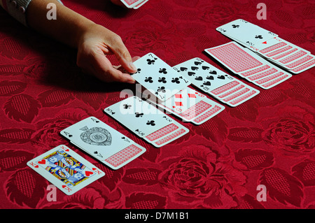 Woman playing patience, England, UK, Western Europe. Stock Photo