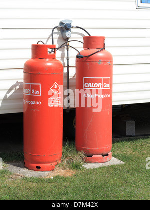Propane gas cylinders on a caravan site Stock Photo