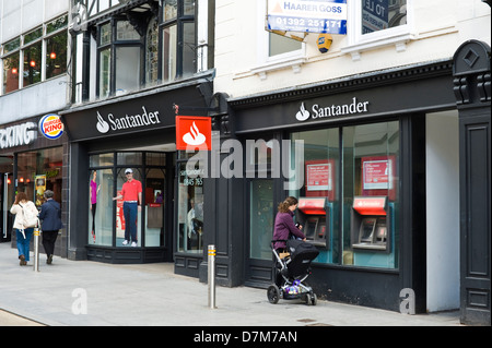 SANTANDER bank cashpoints on high street in city centre of Exeter Devon England UK Stock Photo