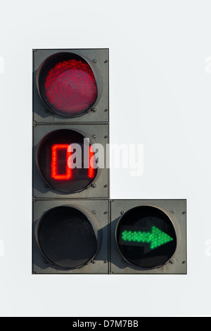 Red traffic light with green arrow and timer, isolated Stock Photo