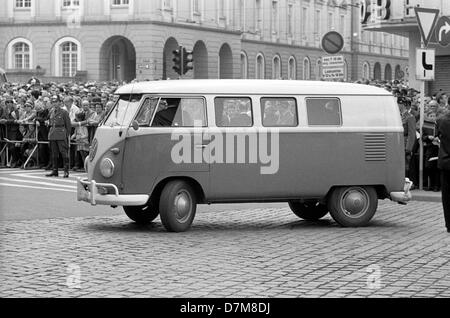 A Volkswagen transporter known als Bulli, in the background people waiting for the arrival of US president John F. Kennedy on 23 July 1963 in Bonn - West Germany. Stock Photo