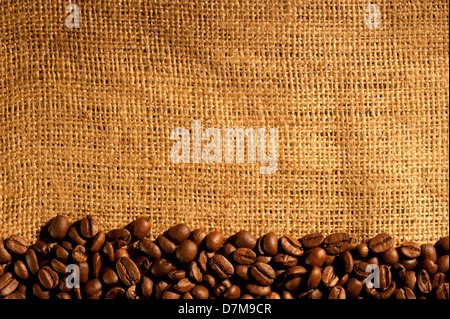 Frame of coffee beans on sacking Stock Photo