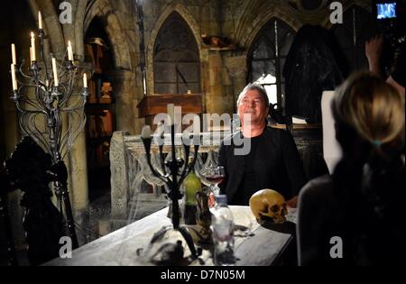 Singer Ian Gillan sits during filming for the video for the song 'Vincent Price' in the newly opened theater for horror shows, the Berlin Dungeon, in Berlin, Germany, 27 April 2013. Photo: BRITTA PEDERSEN Stock Photo