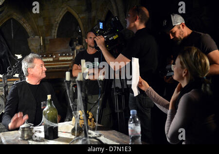 Singer Ian Gillan sits during filming for the video for the song 'Vincent Price' in the newly opened theater for horror shows, the Berlin Dungeon, in Berlin, Germany, 27 April 2013. Photo: BRITTA PEDERSEN Stock Photo