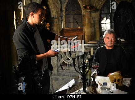 Singer Ian Gillan sits during filming for the video for the song 'Vincent Price' in the newly opened theater for horror shows, the Berlin Dungeon, in Berlin, Germany, 27 April 2013. Photo: BRITTA PEDERSEN Stock Photo