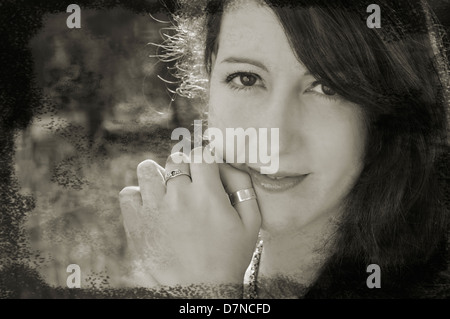 Close-up portrait of a young woman in a forest Stock Photo
