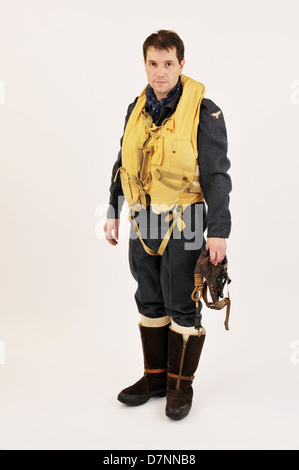 WW2 RAF pilot/crew member wearing flying boots & 'Mae West' life jacket. Stock Photo