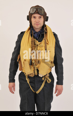 WW2 RAF pilot/crew member wearing flying helmet & 'Mae West' life jacket. Stock Photo