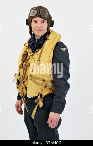 WW2 RAF pilot/crew member wearing flying helmet & 'Mae West' life jacket. Stock Photo