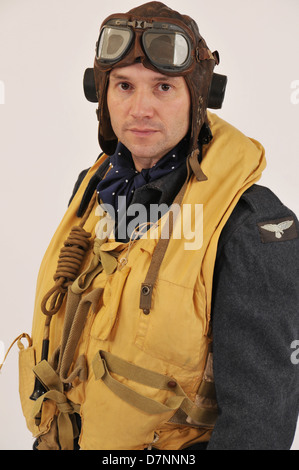 WW2 RAF pilot/crew member wearing flying helmet & 'Mae West' life jacket. Stock Photo