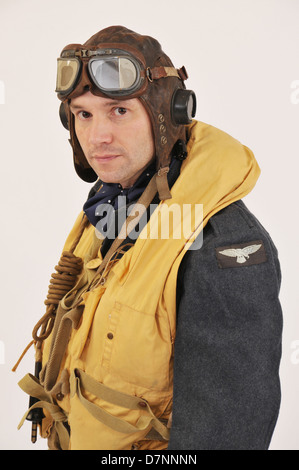 WW2 RAF pilot/crew member wearing flying helmet & 'Mae West' life jacket. Stock Photo