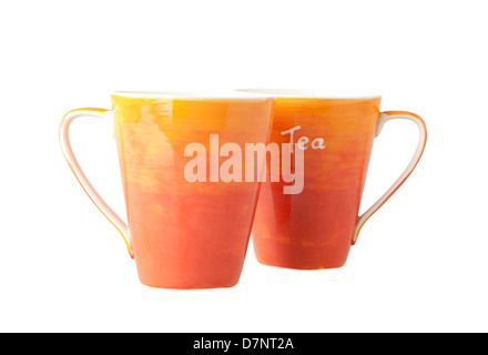 Two colorful porcelain mugs on white background Stock Photo