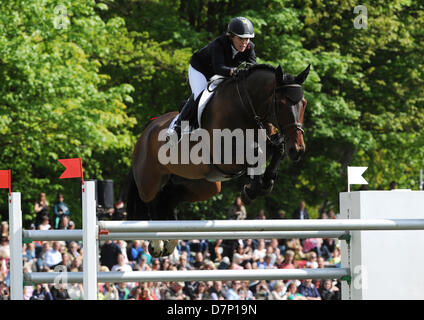 Germany's Meredith Michaels-Beerbaum jumps over a hurdle during the first round at the Global Champions Tour on her horse Bella Donna in Hamburg, Germany, 11 May 2013. Photo: ANGELIKA WARMUTH Stock Photo