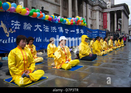 London, UK. 11th May 2012. Protesters practice Falun Gong in Trafalgar Square, 21 years after it first went public in China. Paul Davey/Alamy Live News Stock Photo