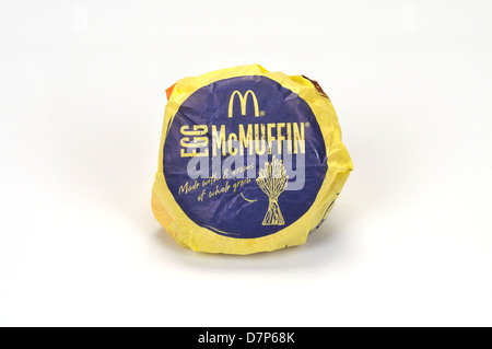 McDonald's Egg McMuffin in paper wrapper packaging on white background, cutout. USA Stock Photo