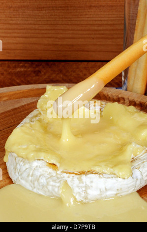 Cut of full fat soft blue cheese Stock Photo - Alamy