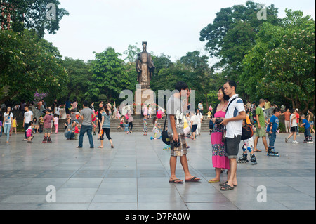 Hanoi , Vietnam - Street scene by the Statue of Ly Thai To in  Indira Gandhi Park Stock Photo