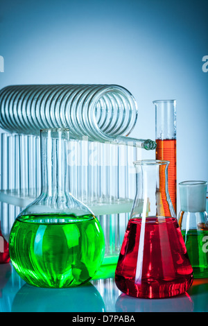 Test tubes on blue background Stock Photo - Alamy