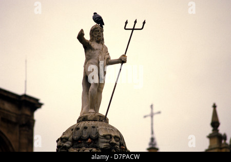 Sculpted figure over a baroque style water fountain in Plaza Bib Rambla also called Plaza de las Flores in the city of Granada Andalusia Southern Spain Stock Photo